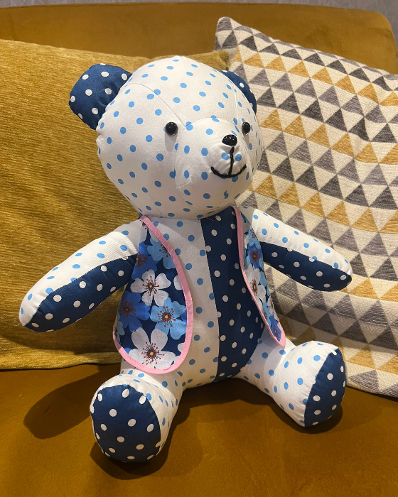 Handmade memory bear stitched from loved clothing